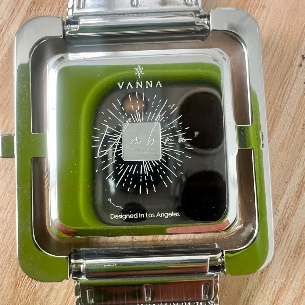 Vanna ladies Umbra ruby red silver tone stainless steel dress watch NEW BATTERY